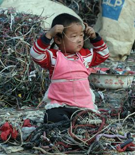 child in e-waste